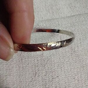 Silvertone textured bangle bracelet